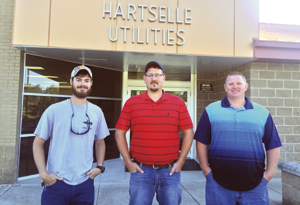 WWTP Promotions Pictured from left to right is Josh Hensley, WWTP Operator Trainee; Wade Sims, WWTP Manager; and David Taylor, Sanitary Sewer Collections System Operator